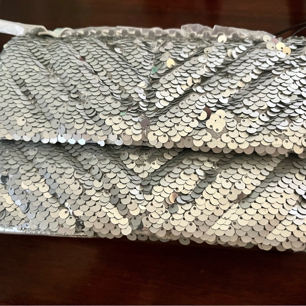 NWT Nicole Miller Silver Clutch with Elegant Design
